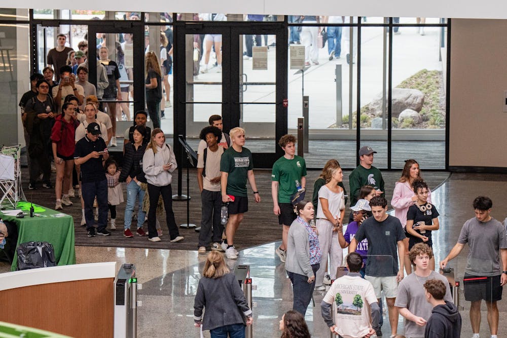 <p>Michigan State University students wait in line to enter the newly opened Student Recreation and Wellness Center during its open house in East Lansing, MI on April 15, 2026.</p>