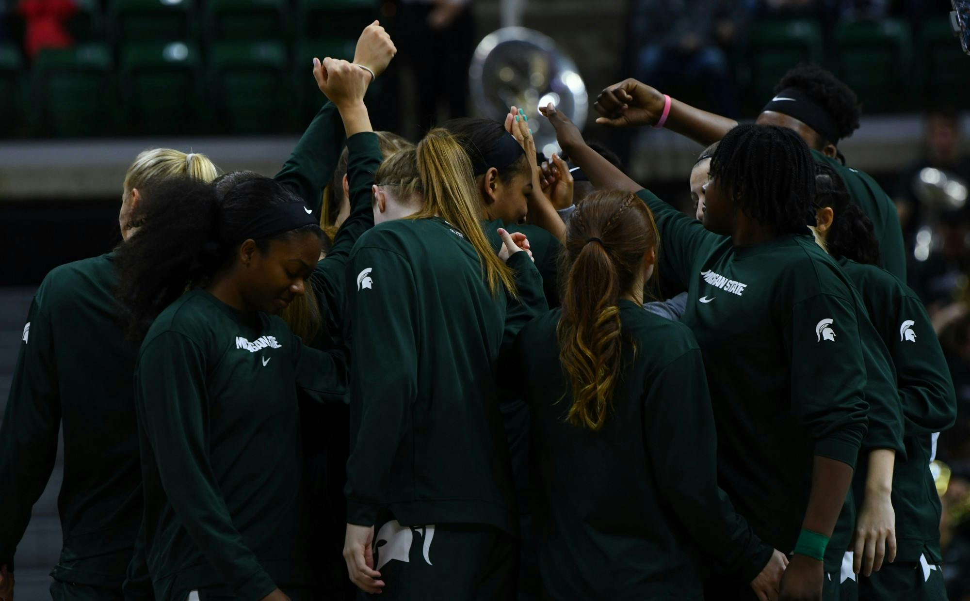 Michigan State starters come together at the beginning of their game against Hartford to chant and get ready. The Spartans crushed the Hawks, 79-34, on Nov. 24, 2019. 