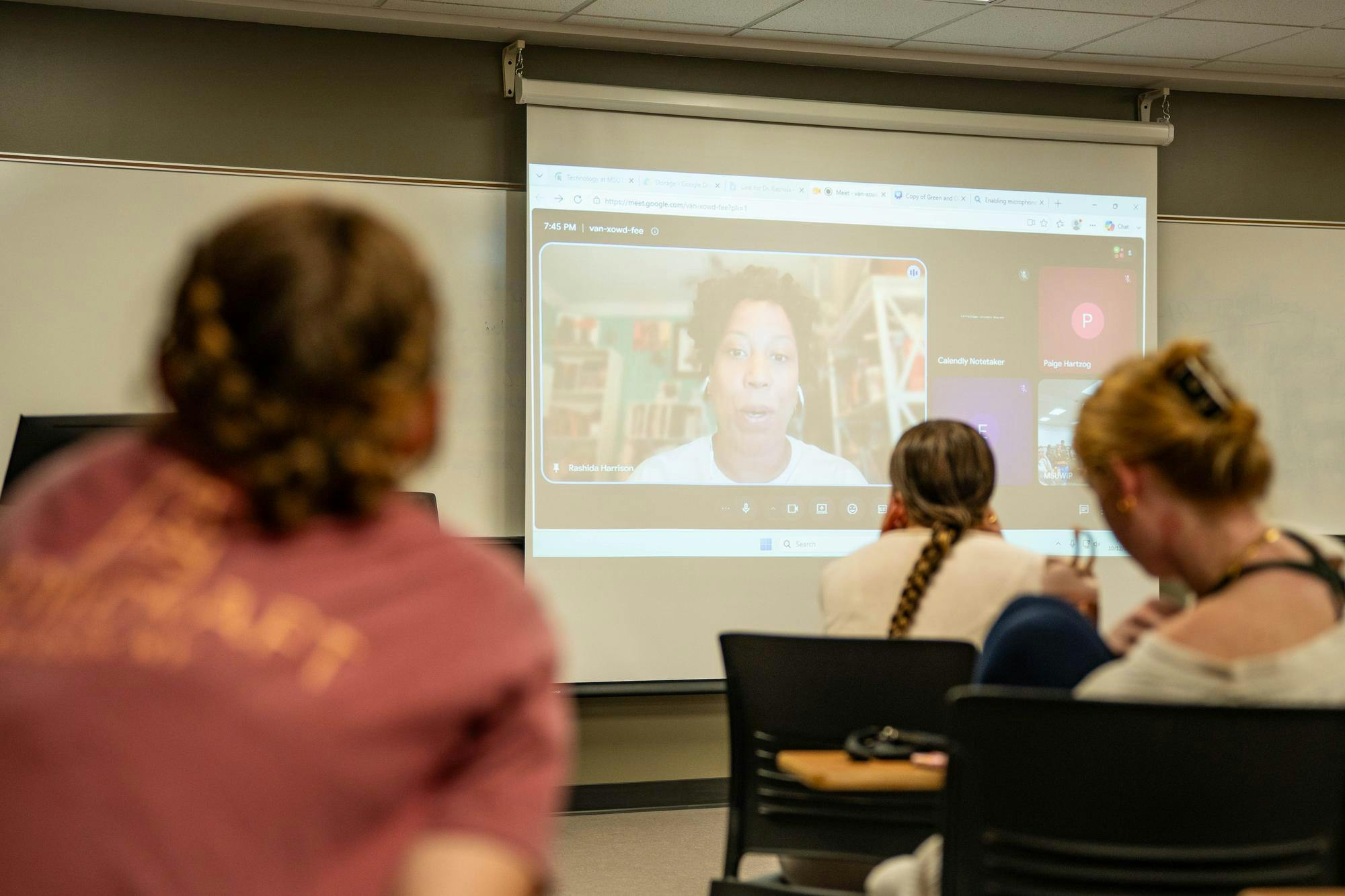 <p>Women in Policy members listen as senate candidate, Rashida Harrison, shares her story on a video conference in Case Hall in East Lansing, Mich., on Monday, Oct. 12, 2026.</p>