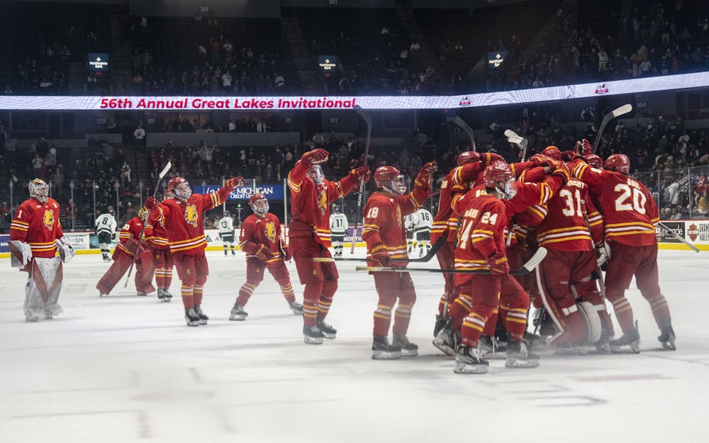 Ferris State celebrates their 4-2 win over Michigan State during their semifinal matchup in the Great Lakes Invitational on Dec. 27, 2022 at Van Andel Arena in Grand Rapids.