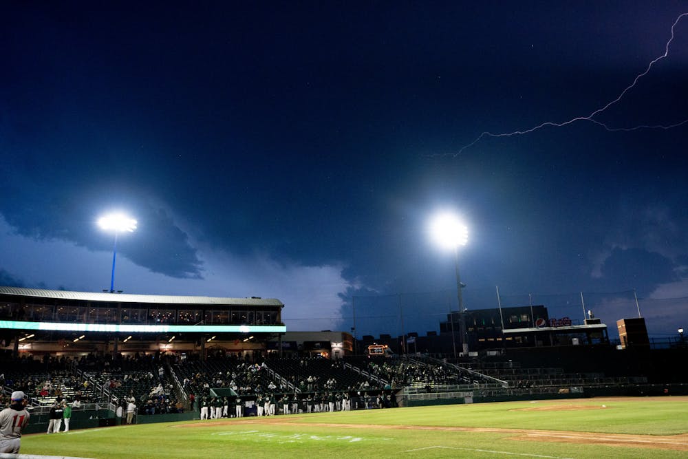 <p>Lightning fills the sky during the Crosstown Showdown between the Lansing Lugnuts and the MSU Spartans at Jackson Field. Despite the following rain delay, the Lugnuts won 12-3 on April 4, 2023.</p>