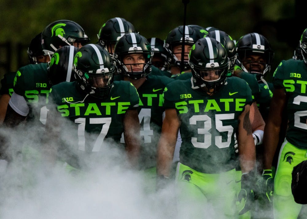 <p>Michigan State football players enter Spartan Stadium before playing Western Michigan. The Spartans defeated the Broncos, 51-17, at Spartan Stadium on September 7, 2019. </p>
