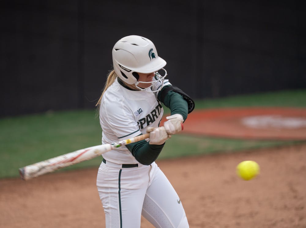 Leftfielder Mackenzie Meech takes an agressive swing during the Ohio State game on April 1, 2022. MSU lost 3-0.