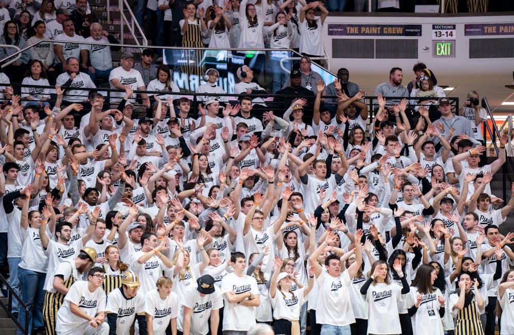 <p>The Purdue student section wave their arms as they cheer on the men's basketball team during a game against MSU at Mackey Arena on Jan. 29, 2023. The Spartans lost to the Boilermakers 77-61.</p>