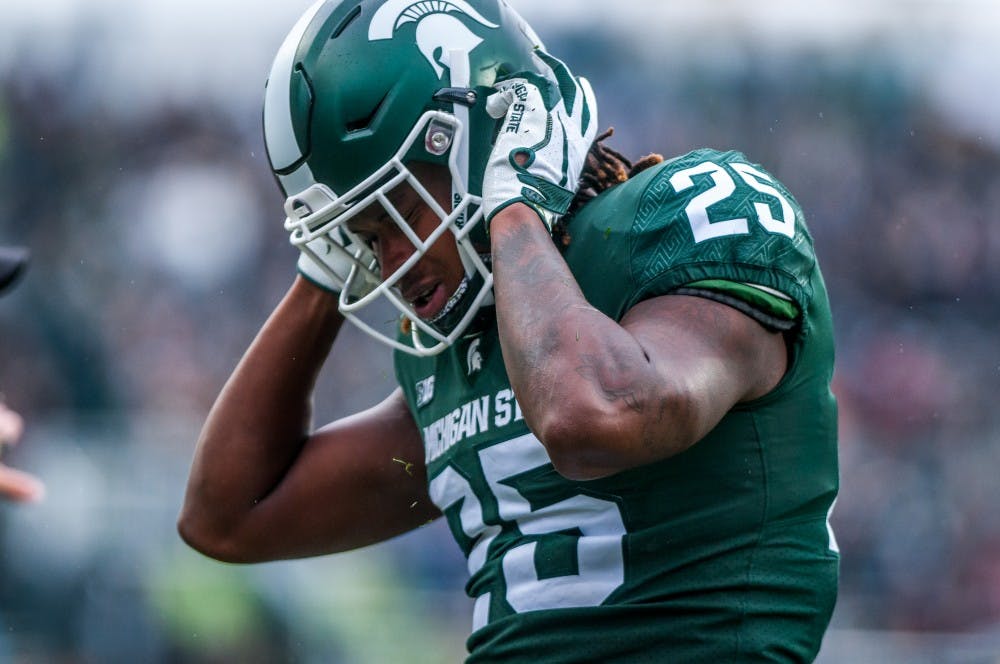 Junior wide receiver Darrel Stewart Jr. (25) puts his hands to his head after dropping a pass during the game against Purdue on Oct. 27, 2018 at Spartan Stadium. The Spartans lead the Boilermakers 13-6 at half.