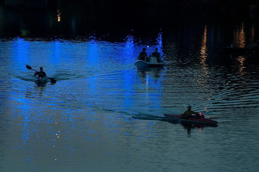 	<p>Kayakers enjoy the music, July 13, 2013, at Adado Riverfront Park in Lansing during Common Ground Music Festival. Saturday’s performers appealed toward fans of folk music. Julia Nagy/The State News</p>