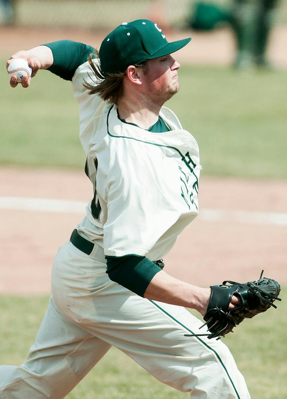 <p>Sophomore pitcher Anthony Misiewicz throws out a pitch during the game against Siena on April 6, 2014, at McLane Baseball Stadium at Old College Field. The Spartans defeated the Saints, 5-1. Danyelle Morrow/The State News</p>