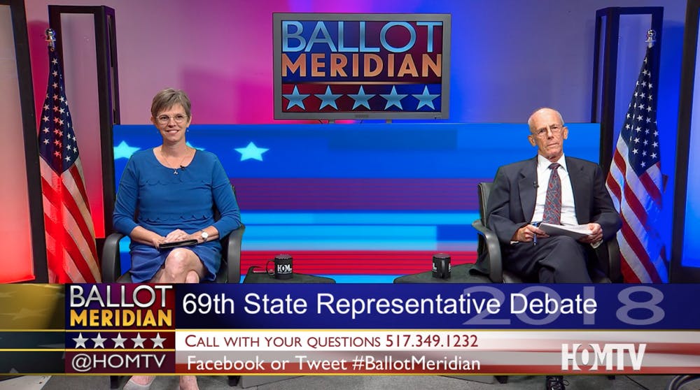 Candidates for the Michigan House of Representatives debate on Oct. 4. Democrat Julie Brixie (left) and Republican George Nastas (right) faced questions from a HOMTV moderator and members of the audience who called in to the station. Photo courtesy of HOMTV