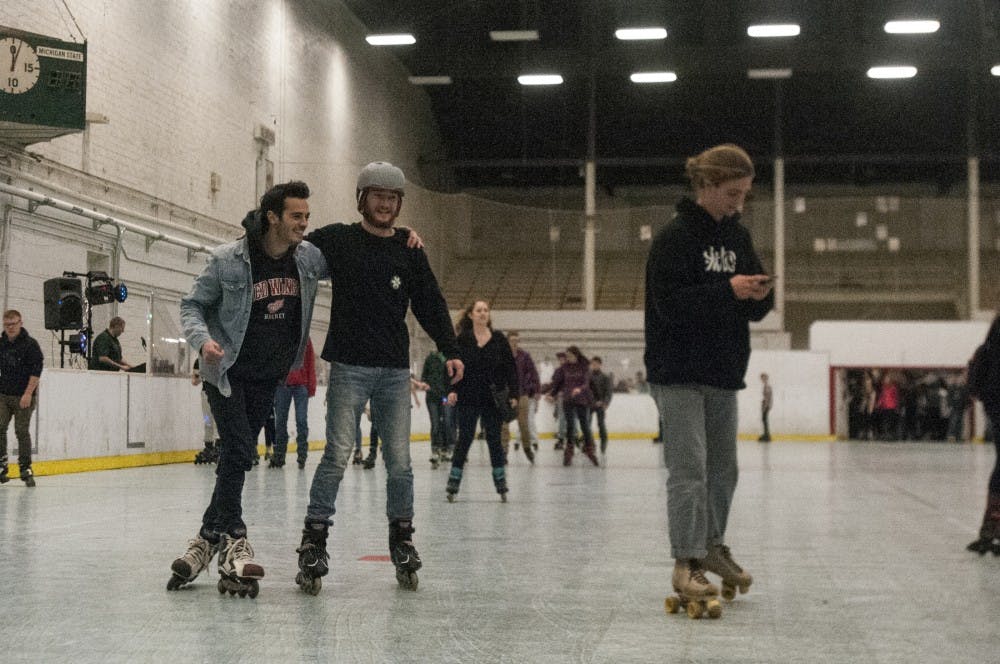 People roller-skate for 90's Roller Skating Night on Nov. 11, 2016 at Demonstration Hall.  