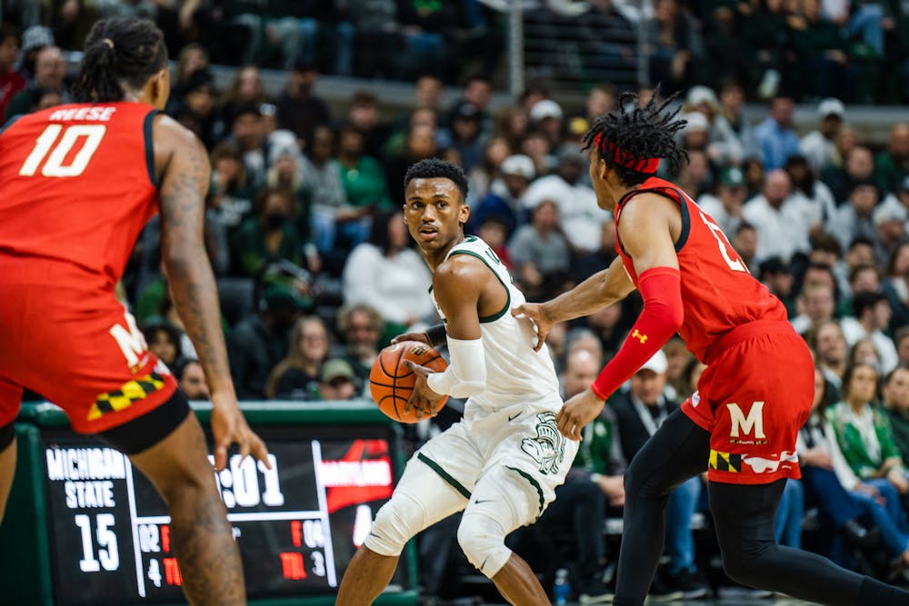 <p>Senior guard Tyson Walker (2) prepares to send a pass to his opponents across the court against Maryland on Feb. 7, 2023. The Spartans defeated the Terps with a score of 63-58.</p>