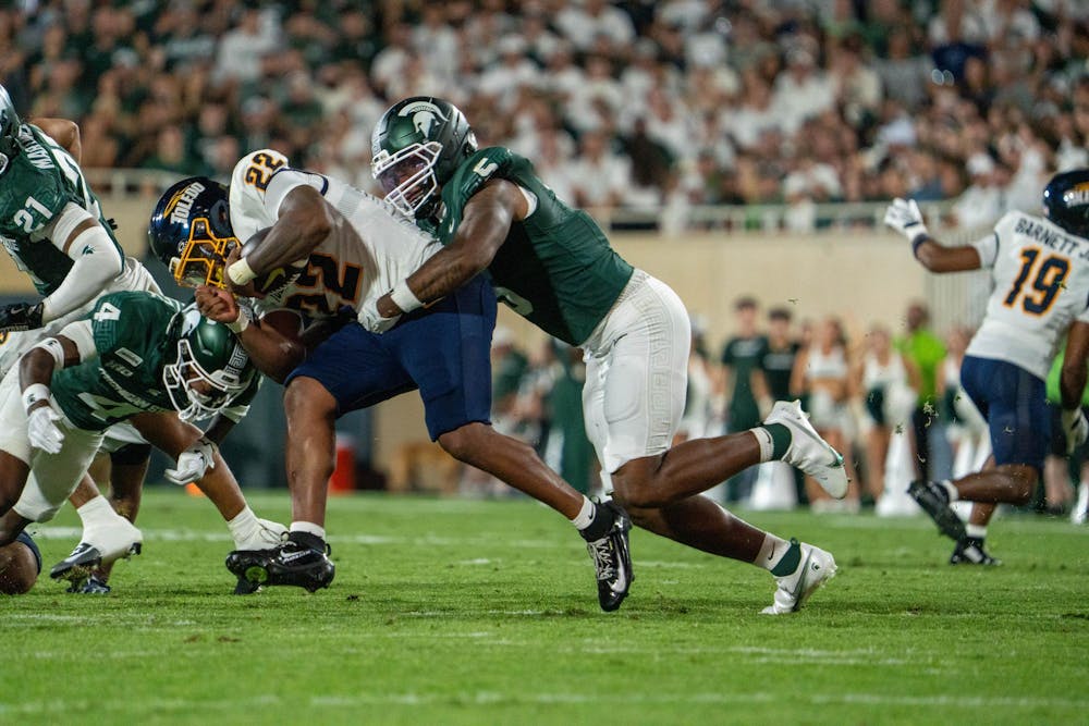 <p>Jordan Hall (5) of MSU sacks Nicholas Thompson (22) of Toledo during the Michigan State vs. Toledo football game at Spartan Stadium in East Lansing, Mich., on Friday, Sept. 4, 2026.</p>