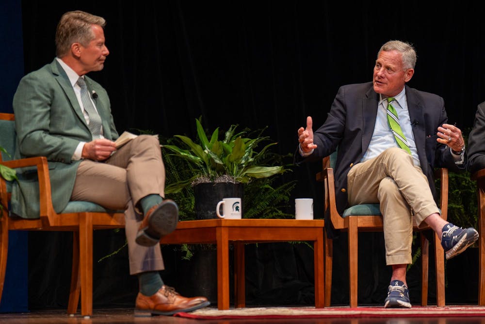 Michigan State University President Kevin M. Guskiewicz and Richard Burr, former U.S. senator from North Carolina speak during the first Presidential Speaker Series, a panel discussion is held at the Wharton Center for Performing Arts on Michigan State University’s campus in East Lansing, Mich., on Tuesday, March 17, 2026.