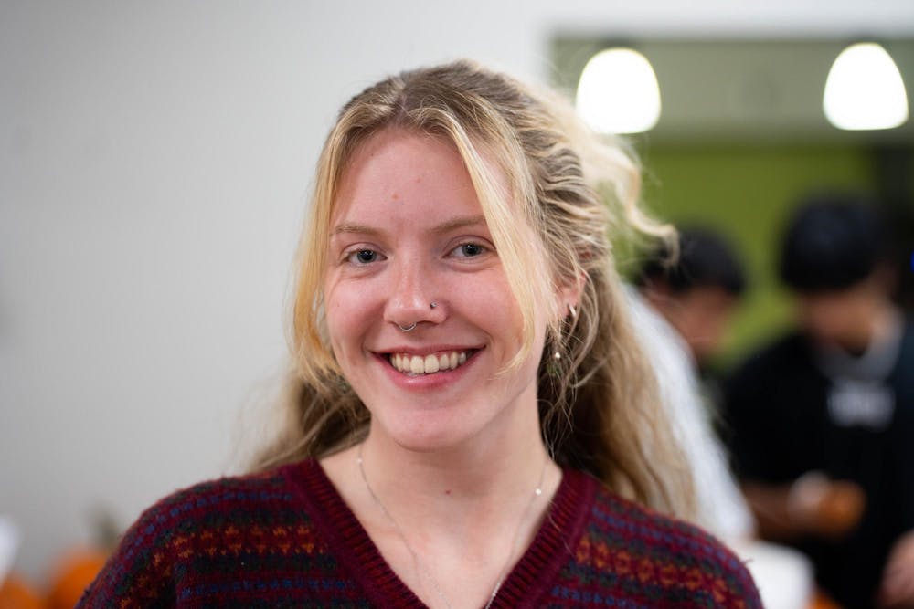 <p>MSU Slow Food Club E-board member, Senior Secretary Taylor Workman at the Pumpkin Seed Roasting event at McDonel Hall, Oct. 9th, 2025</p>