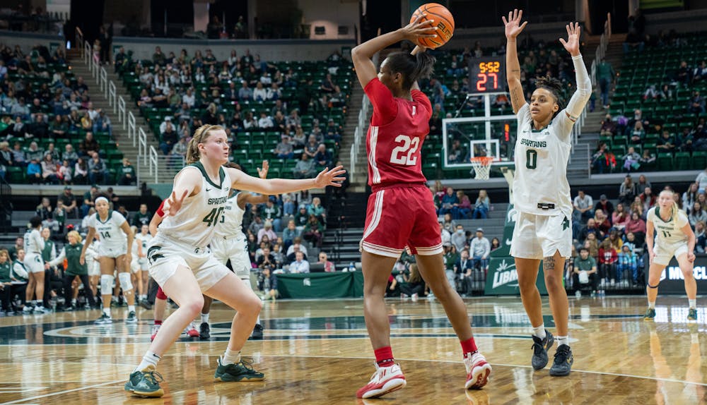 <p>Michigan State&#x27;s DeeDee Hagemann (0) and Julia Ayrault (40) defend against Indiana&#x27;s Chloe Moore-McNeil (22). The Spartans defeated the Hoosiers 83-78 on Dec. 29, 2022.</p>