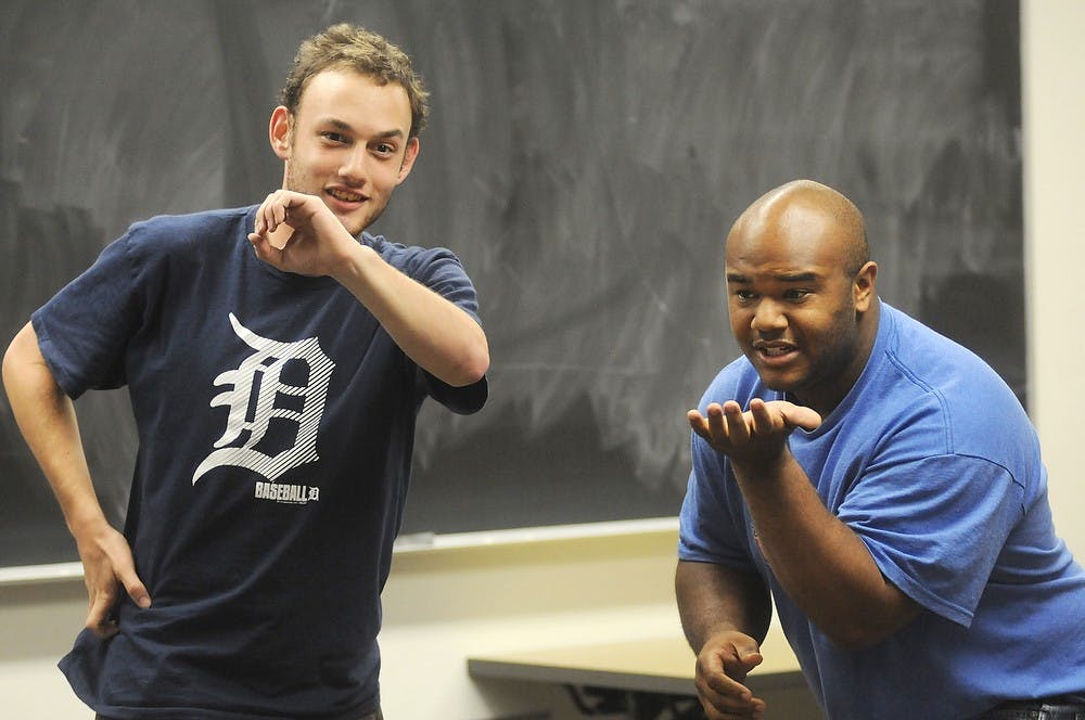 <p>Residential College in the Arts and Humanities junior Zack Silverman and political science junior Bobby Parsons practice improv on Sept. 10, 2014, in Snyder-Phillips Hall. The improv group rehearsed different games for upcoming shows. Aerika Williams/The State News</p>