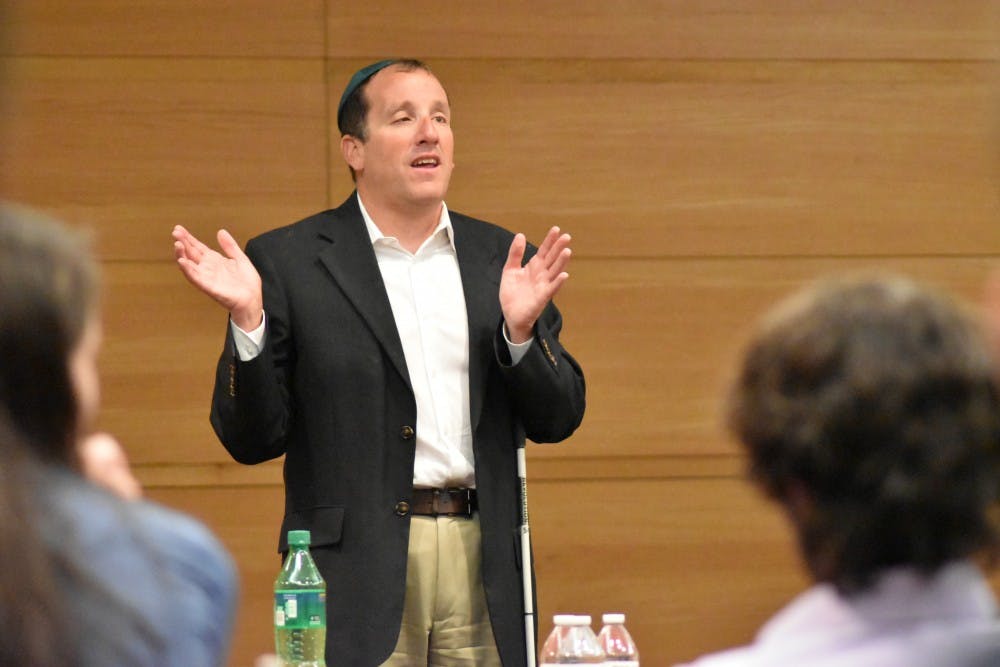 Michigan Supreme Court Justice Richard Bernstein speaks to members of the Chabad Student Center at MSU on Oct. 18.