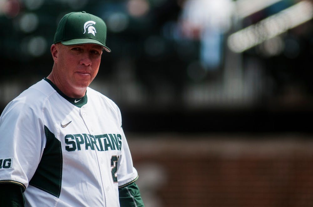 Head coach Jake Boss walks towards the dugout during the game against Nebraska on May 9, 2016 at McLane Stadium. The Spartans were defeated by the Cornhuskers, 7-4.