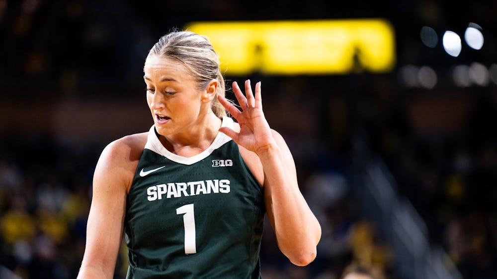 <p>Michigan State graduate student guard/forward No. 1Tory Ozment taunts the crowd at the Crisler center in Ann Arbor on Feb. 18, 2024. Michigan State secured a season sweep of the rival Wolverines, breaking a two-game losing streak in the process.</p>