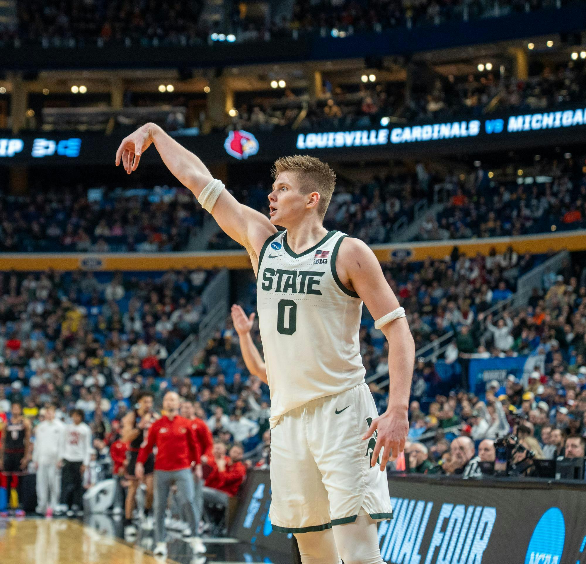 Senior forward Jaxon Kohler (0) goes up for a shot during the March Madness matchup against University of Louisville at the KeyBank Center in Buffalo, New York on March 21, 2026.