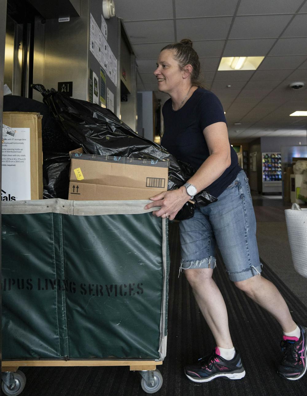 <p>Nina Medved moves in her daughter, Tierney Ordway, to Akers Hall during Fall 2022 Move-In on Thursday, Aug. 25, 2022 at Michigan State University.</p>