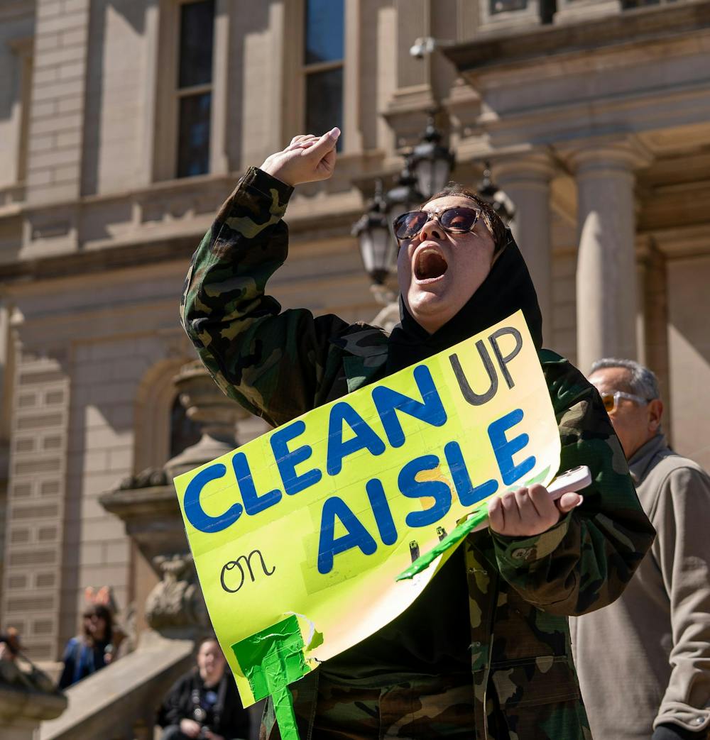 <p>A protestor uses their voice during the No Kings Protest at the Michigan State Capitol in Lansing, MI on March 28, 2026.</p>