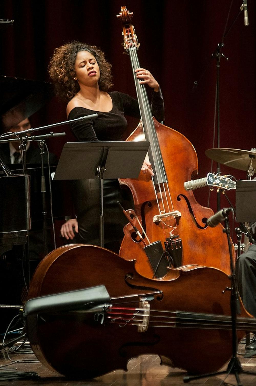 <p>Doctoral student and bassist Anessa Al-Musawwir performs during the MSU Federal Credit Union Jazz Artist in Residence show on Oct. 10, 2014, at Fairchild Theater in the Auditorium building. Al-Musawwir is a member of MSU Jazz Orchestra II. Raymond Williams/The State News</p>