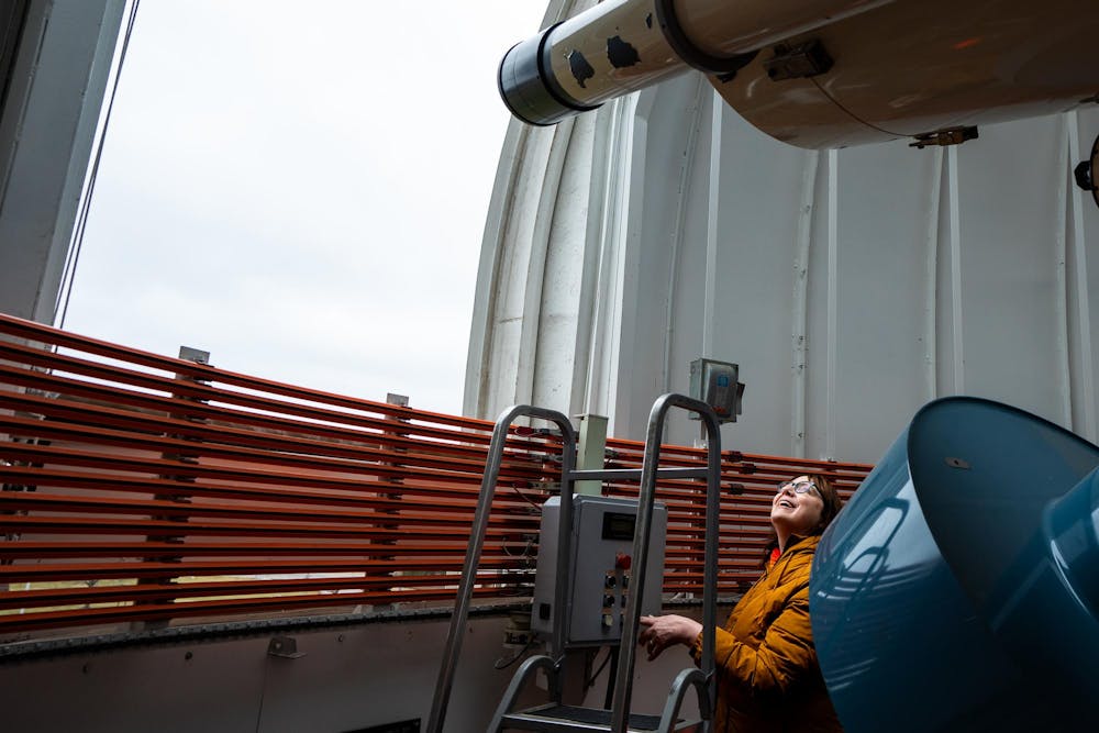 Laura Chomiuk, professor in the Department of Physics and Astronomy, opens the doors of the observatory dome on the campus of Michigan State University in East Lansing, Mich., on Friday, Feb. 22, 2026.