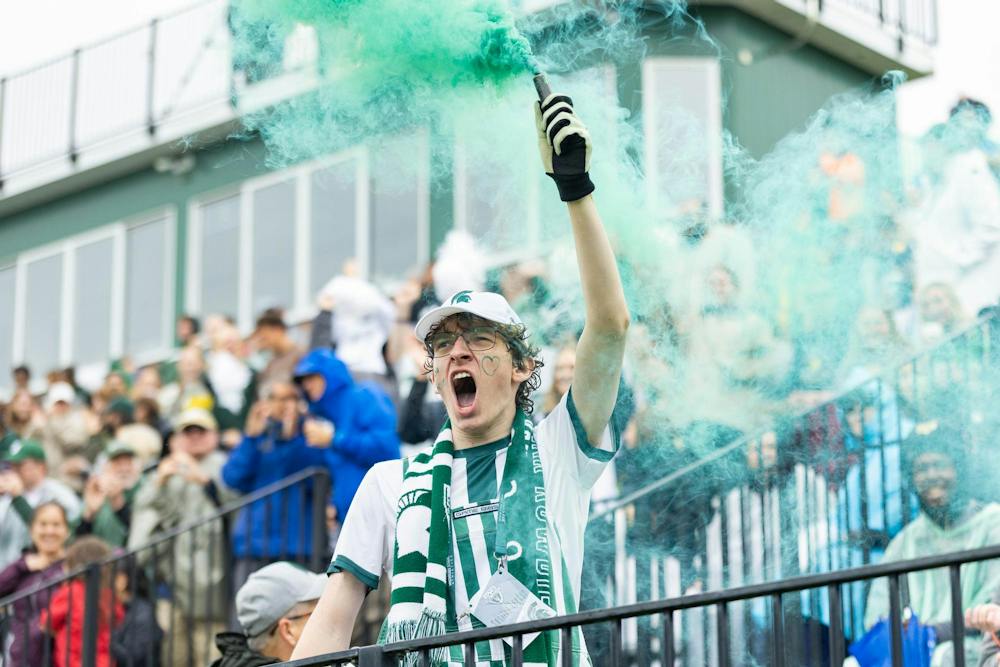 <p>A Red Cedar Rowdies leader celebrates the first goal of the game by the Spartans, early in the second half of their game against Michigan at DeMartin Stadium in East Lansing, Mich., on Sept. 20, 2026.</p>