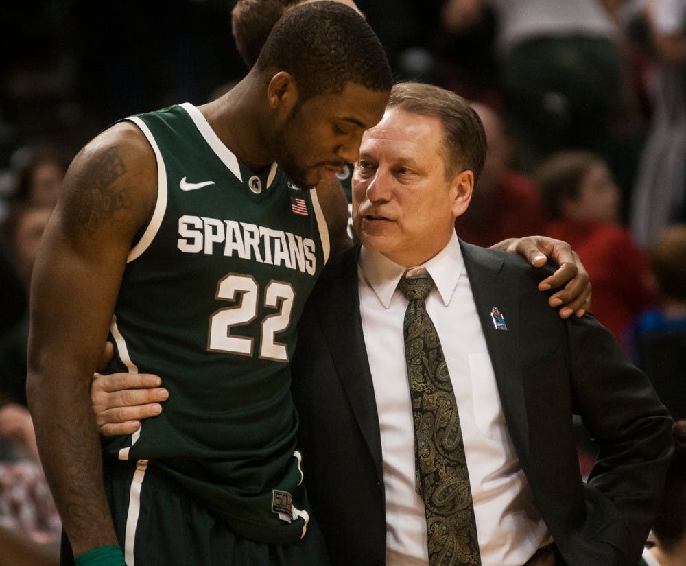 <p>Head Coach Tom Izzo and junior forward Branden Dawson talk March 15, 2014, during a game against Wisconsin at the Big Ten Tournament in Indianapolis at Bankers Life Fieldhouse. The Spartans defeated the Badgers, 83-75. Erin Hampton/The State News</p>