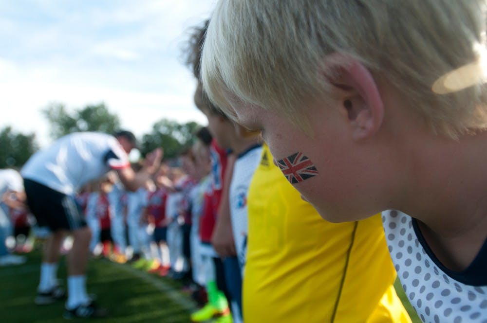	<p>Great Britain soccer player Mark Swan, 12, right, looks down the line August 8, 2013, during the World Dwarf Games at DeMartin Soccer Stadium. Great Britain beat the <span class="caps">USA</span> 3-2. Weston Brooks/The State News</p>
