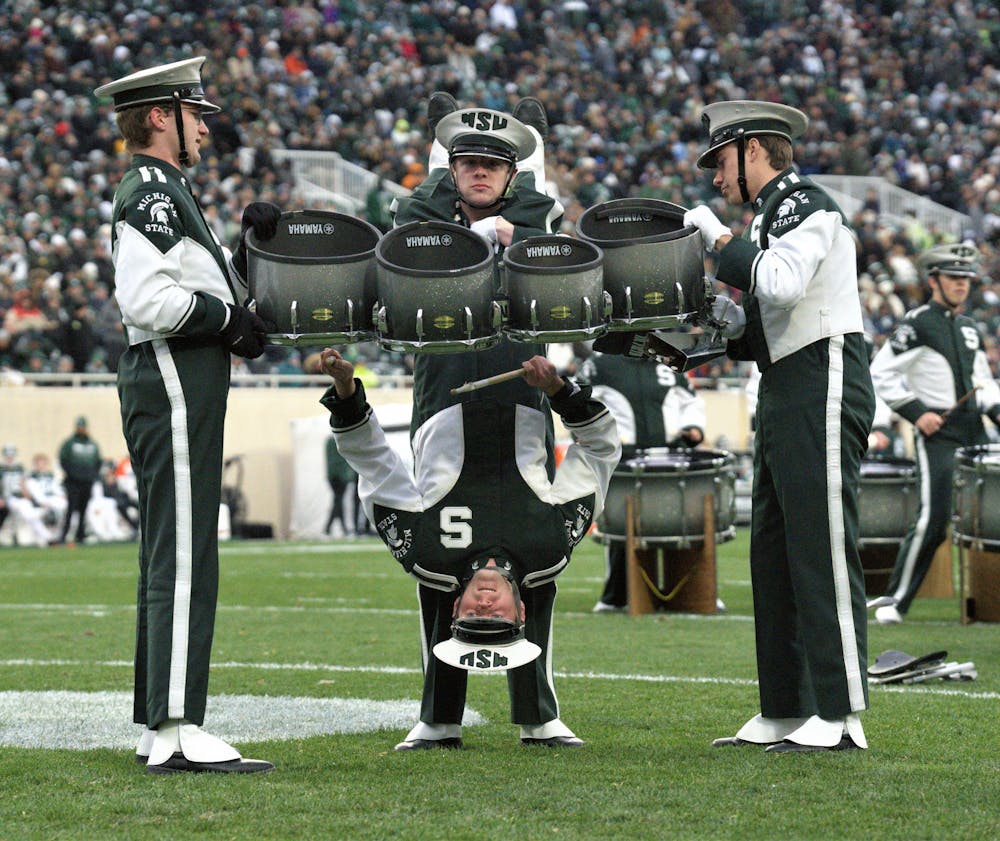 <p>Members of the Spartan Drumline perform during a time-out during the game against the Rutgers on Nov. 12, 2022.﻿</p>