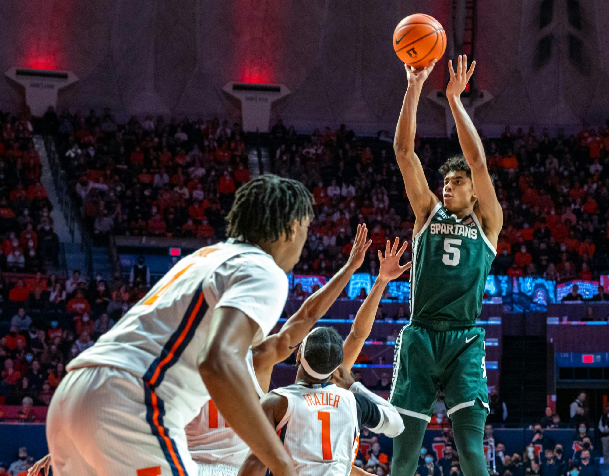 <p>Freshman guard Max Christie (5) shoots at the Illinois basket during the second half. The Spartans lost to the Fighting Illini in the final seconds, 56-55, at State Farm Center on Jan. 25, 2022. </p>