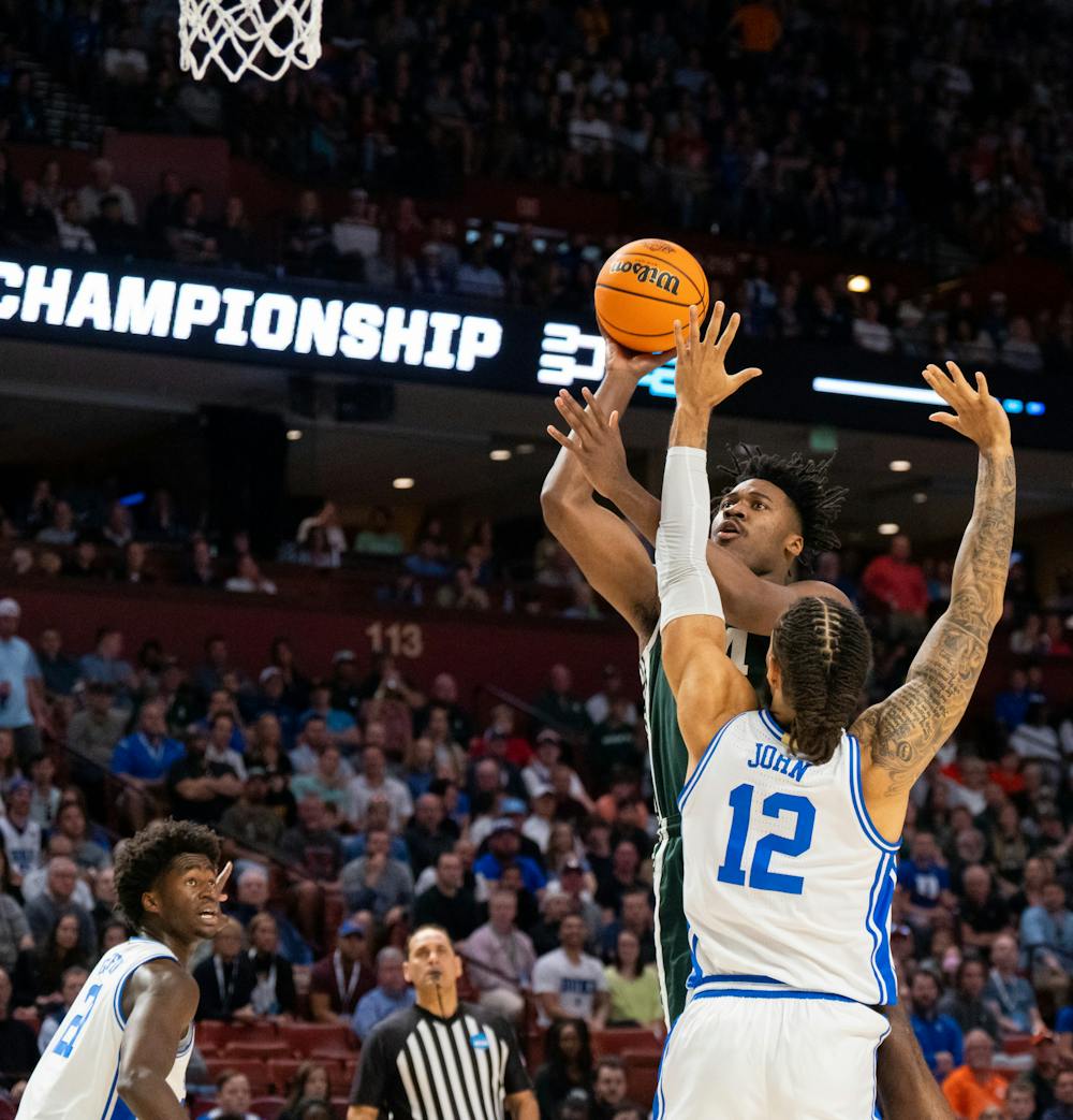 Julius Marble II (34) attempts to shoot the ball during Duke's victory over Michigan State on March 20, 2022.