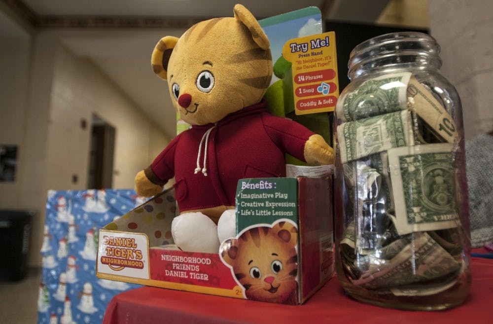 Toys and donations, pictured here Nov. 29, 2016 at Berkey Hall, are part of a month-long toy drive spearheaded by interdisciplinary studies junior Shanika Kidd. 