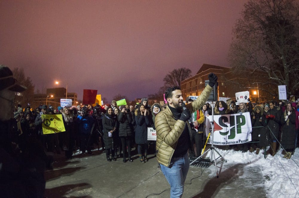 Senior political theory and constitutional democracy and pre-med Abraham Aiyash leads chant on Jan. 31, 2017 at The Rock. Aiyash is the president of the The Michigan State Muslim Students' Association who hosted a "No Ban, No Wall: Spartans for Sanctuary and Solidarity" as a response to President Trump's executive order on immigrants and refugees.