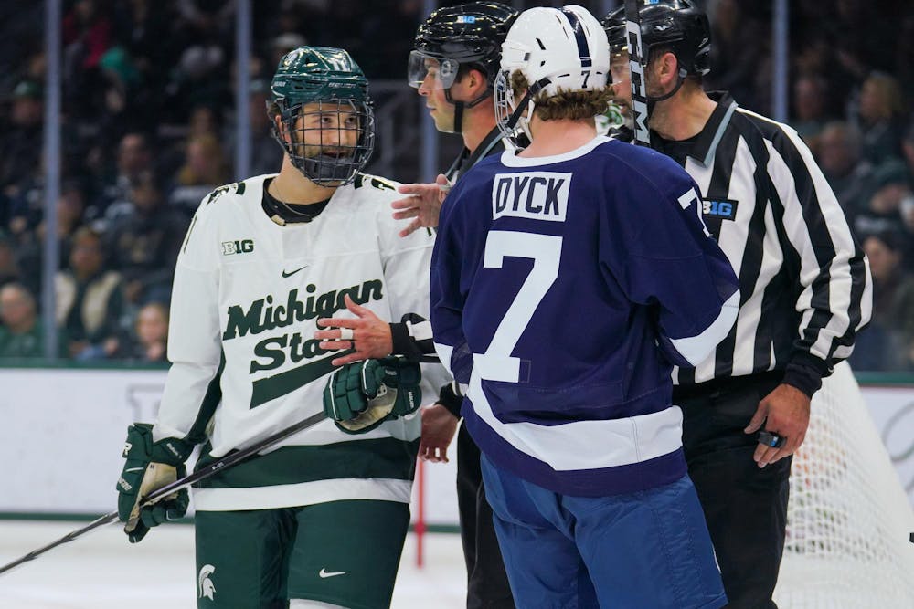 <p>Senior forward Jeremy Davidson (11) arguing with junior forward Carson Dyck (7) in a game between Michigan State and Penn State at the Munn Ice Arena on Nov. 10, 2023.</p>