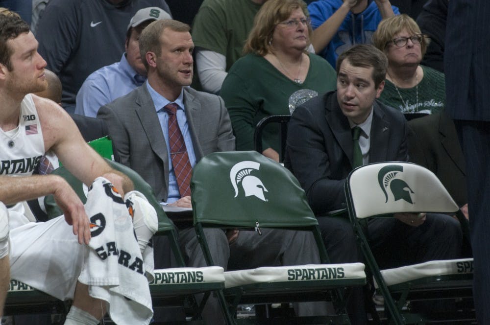 Assistant coach Austin Thornton watches the game against Nebraska on Jan. 20, 2016 at Breslin Center. The Spartans were defeated by the Cornhuskers 72-71.