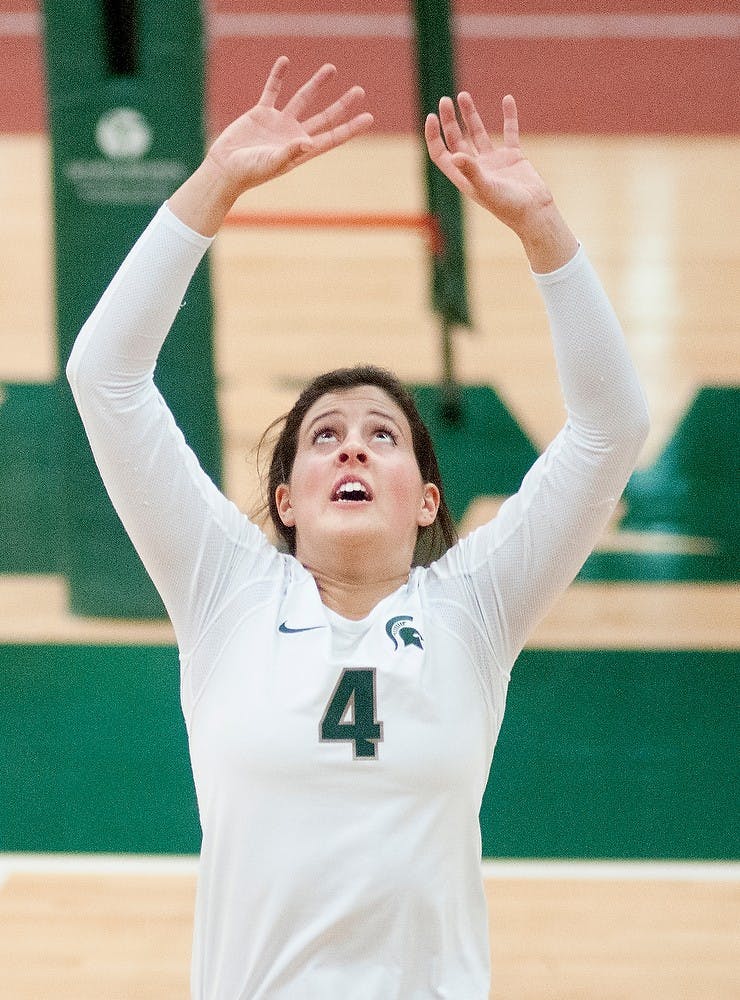 Freshman setter Halle Peterson prepares to set the ball at Jenison Field House on Nov. 2, 2012 in the volleyball game versus Iowa. MSU won the game in three straight sets. Danyelle Morrow/The State News