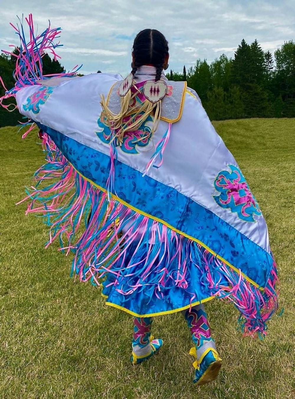 <p>Social relations and policy junior Neely Bardwell wearing a fancy shawl regalia at the Red Cliff, Wisconsin powwow. Courtesy of Neely Bardwell.</p>