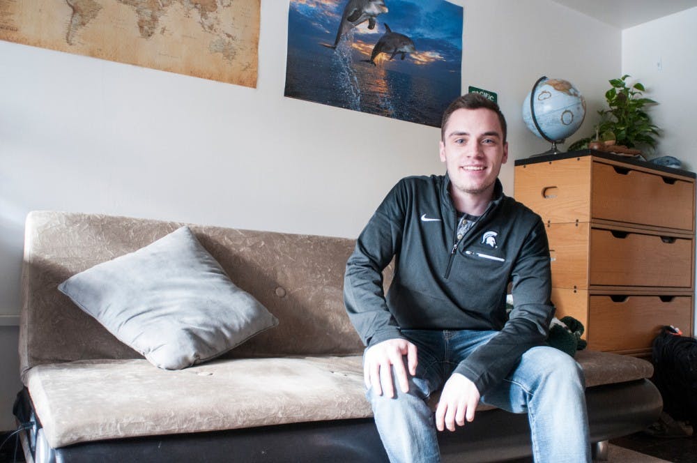 Environmental studies and sustainability sophomore Carter Helinski poses for a portrait on March 15, 2017 in his dorm room. He has known for two years that he has a brain tumor which needs to be removed. "It could be worse... could be cancer, could not have known about it," Helinski said.