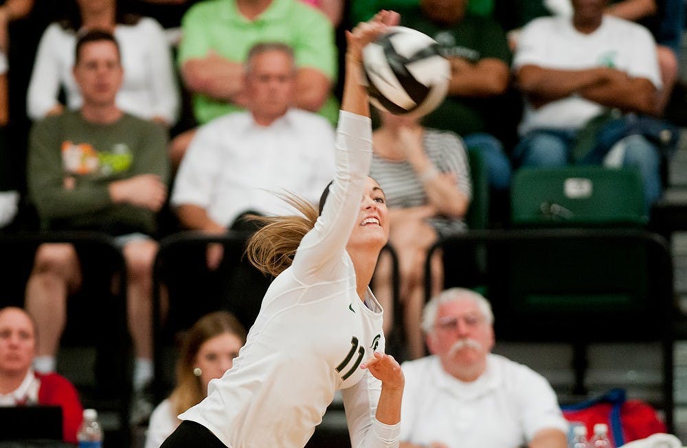 	<p>Freshman outside hitter Chloe Reinig spikes the ball Oct. 12, 2013 at Jenison Field House. The Spartans defeated the Cornhuskers, three sets to one. Khoa Nguyen/The State News</p>