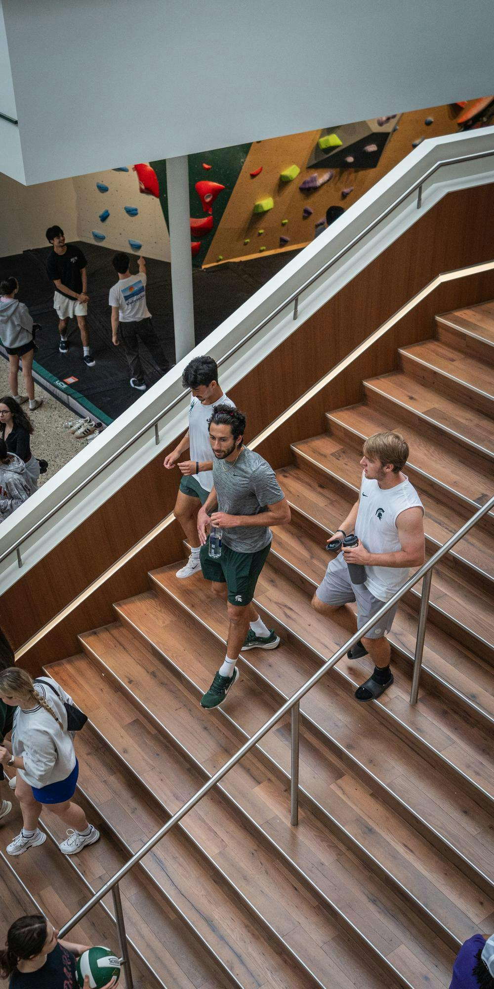 <p>MSU men's tennis player, Ozan Baris (middle), walks with 2 supporters of the team during the new Student Recreation and Wellness Center open house in East Lansing, MI on April 15, 2026.</p>