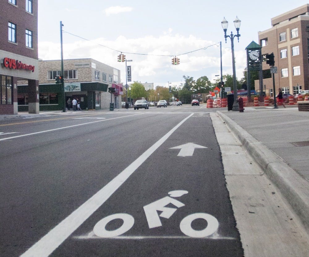 A new bike lane was added to the corner of Albert and Mac Avenues in this photo from Sunday, Spet. 9, 2012. This project was one of many new additions to East Lansing this year. James Ristau/The State News