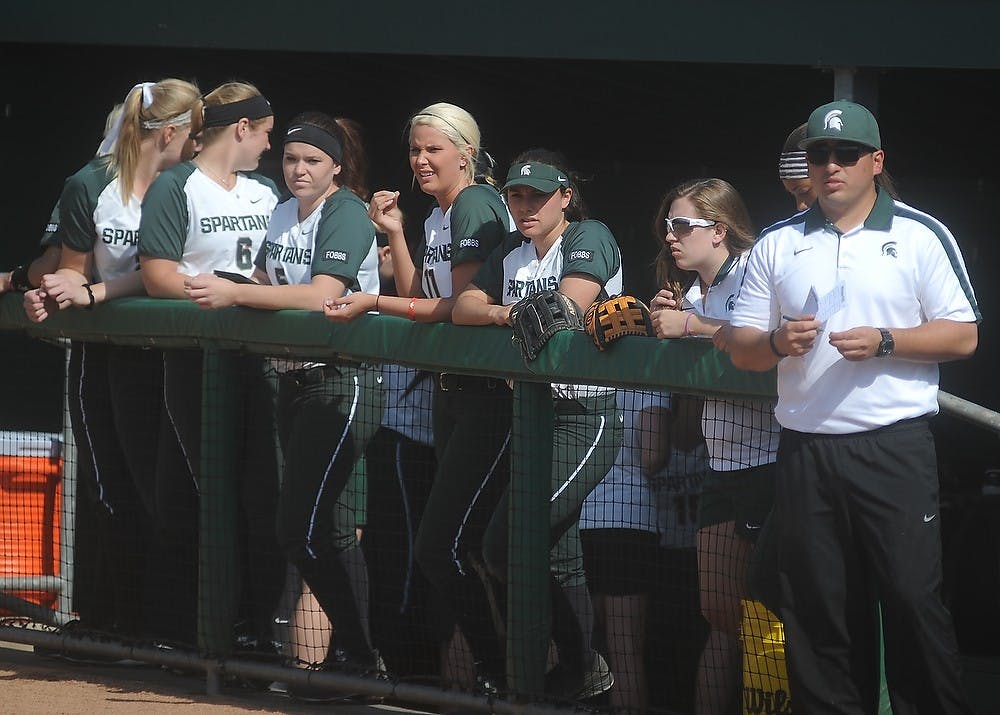 <p>The team watches the field April 17, 2015, during a game against Minnesota at Secchia Softball Stadium. The Spartans were defeated by the Golden Gophers, 8-4. Alice Kole/The State News</p>