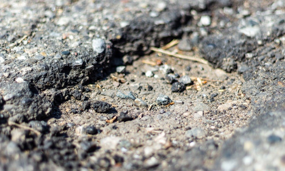 A pothole in East Lansing on March 28, 2019.