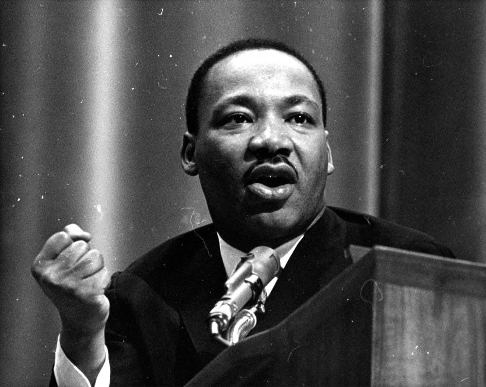 <p>Martin Luther King Jr. speaks at Michigan State University on February 11, 1965. Photo courtesy of MSU Archives.</p>