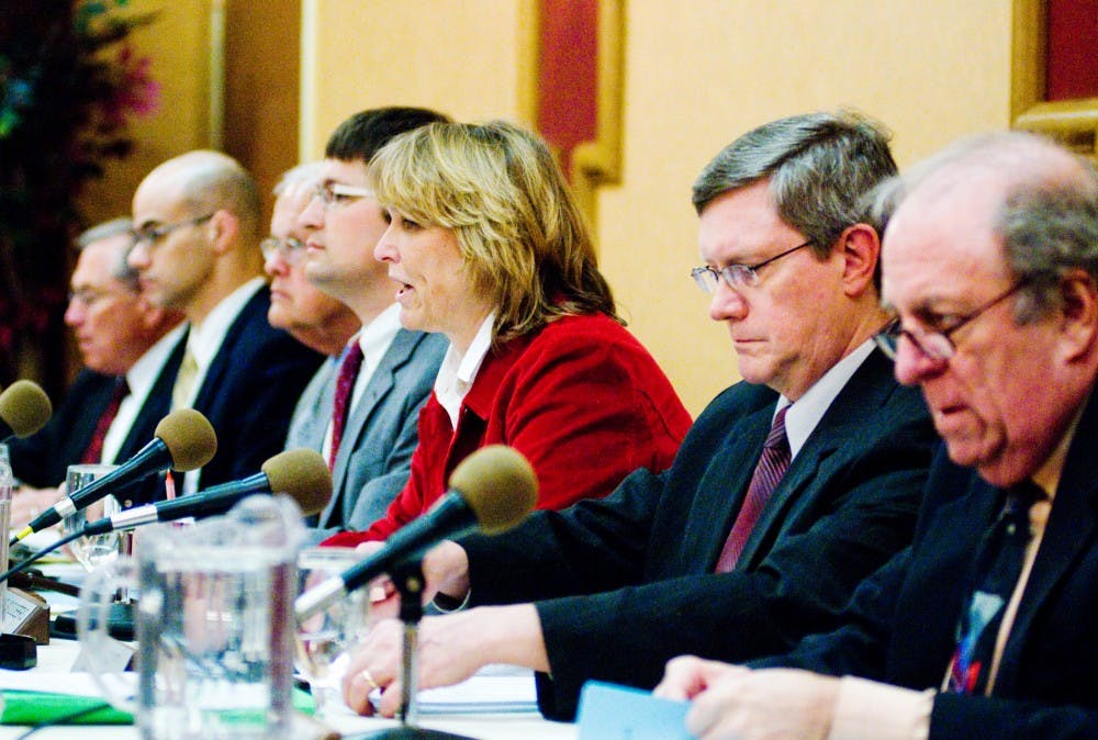 East Lansing mayor Diane Goddeeris speaks to the audience at a City Council meeting Tuesday night in gold rooms A&B at MSU Union. Mayor Goddeeris and councilmembers deliberated on the topic of constructing an addition onto the FarmHouse Fraternity, 151 Bogue St. Aaron Snyder/The State News. 