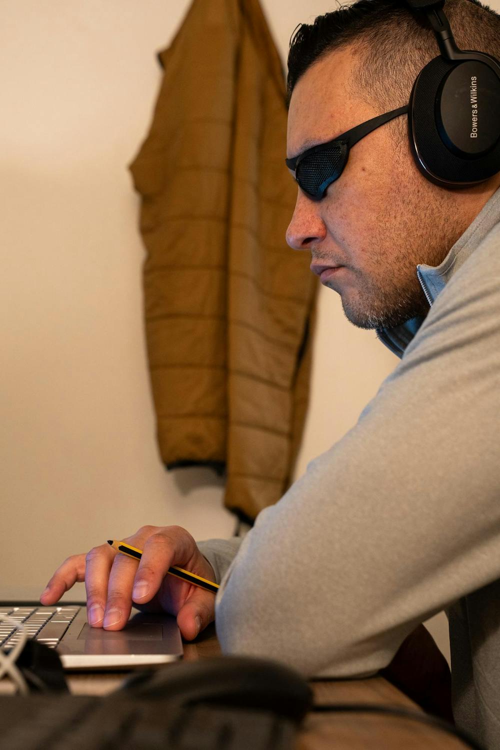 Education junior and U.S. Army veteran Jay Velez studies in the Student Veterans Resource Center on April 11, 2025. Velez was medically separated from the Army after 22 yearrs of service when he developed issues with his eyes.
