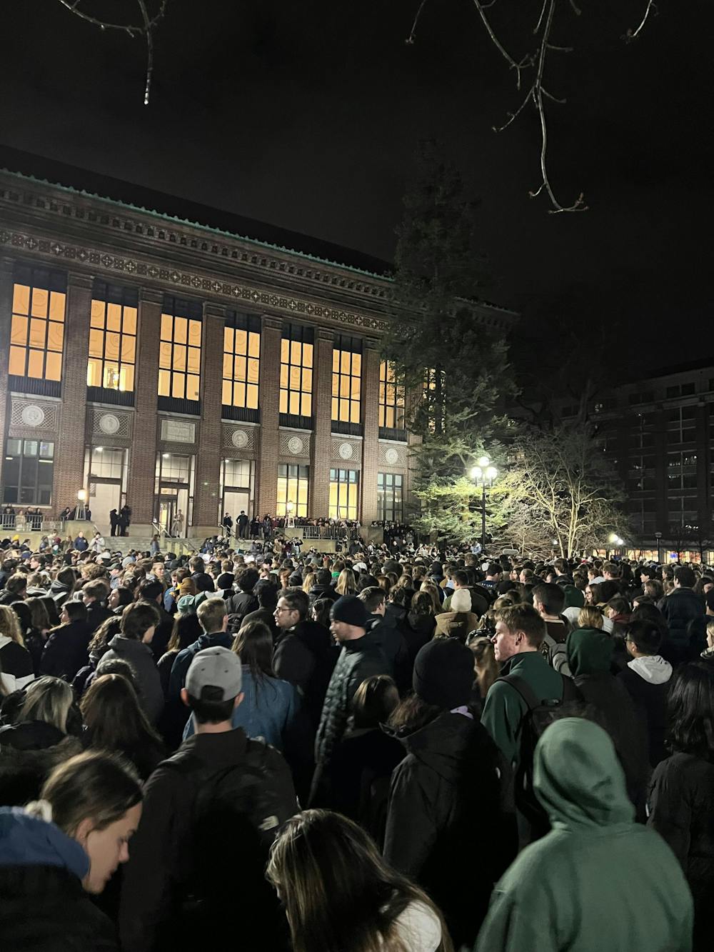 University of Michigan students and Ann Arbor residents attend a vigil on Wednesday, Feb. 15, in honor of the eight MSU students who died or were hospitalized because of the mass shooting on MSU's campus Feb. 13. 