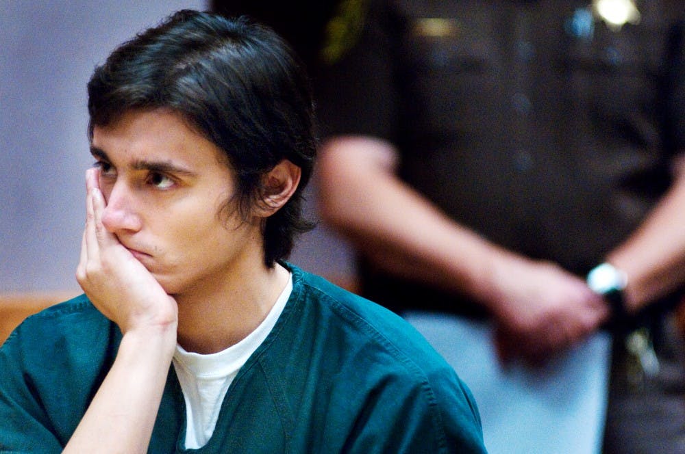 	<p>College of Osteopathic Medicine graduate student Andrew Thompson listens as Judge Richard Ball denies denies a request to reduce his $500,000 bond Friday morning at the 54B District Court. Judge Ball refused to lower Thompson&#8217;s bond due to his lack of ties to the East Lansing community as well as the threats Thompson made against his former roommate Chelsea Grimes, a key witness in the case.</p>